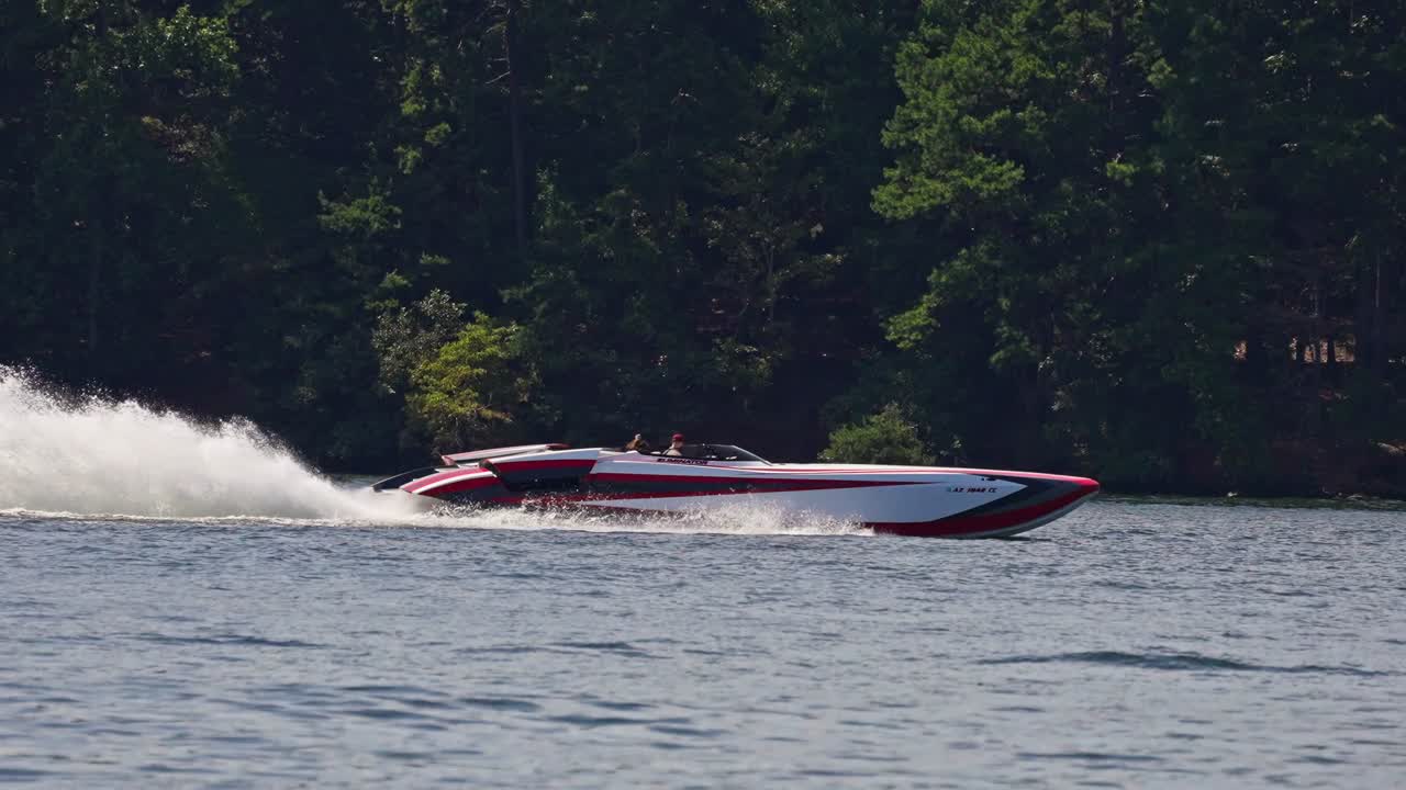 High-performance boat on the water at sunset